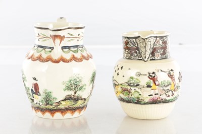 Lot 68 - TWO EARLY 19TH CENTURY LEEDS WARE SPORTING JUGS