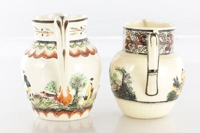 Lot 68 - TWO EARLY 19TH CENTURY LEEDS WARE SPORTING JUGS