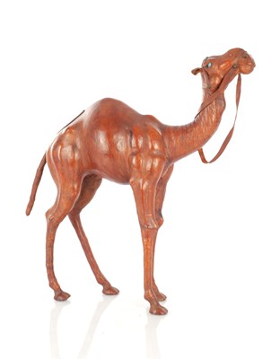 Lot 753 - A LEATHER COVERED MODEL OF A CAMEL IN THE MANNER OF LIBERTY OF LONDON