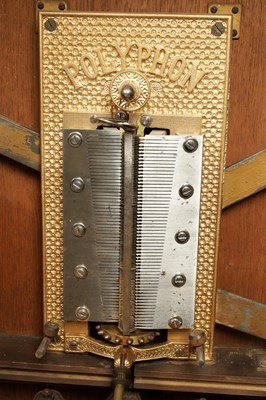 Lot 1038 - A LATE 19TH CENTURY “PENNY IN THE SLOT” UPRIGHT POLYPHON