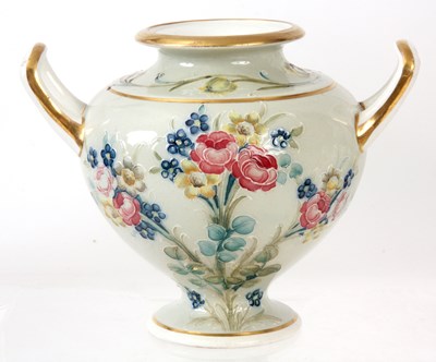 Lot 25 - WILLIAM MOORCROFT, A STYLISH URN SHAPED DOUBLE...