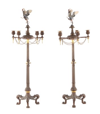 Lot 770 - A LARGE PAIR OF REGENCY STYLE PATINATED AND COLD PAINTED BRONZE CANDELABRA