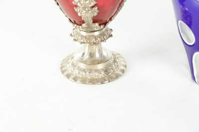 Lot 16 - TWO LATE 19TH CENTURY GLASS AND SILVER PLATED CLARET JUGS
