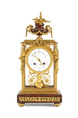 Lot 1481 - REVEL, PARIS. A LATE 19TH CENTURY FRENCH ROUGE MARBLE AND ORMOLU FOUR GLASS MANTEL CLOCK