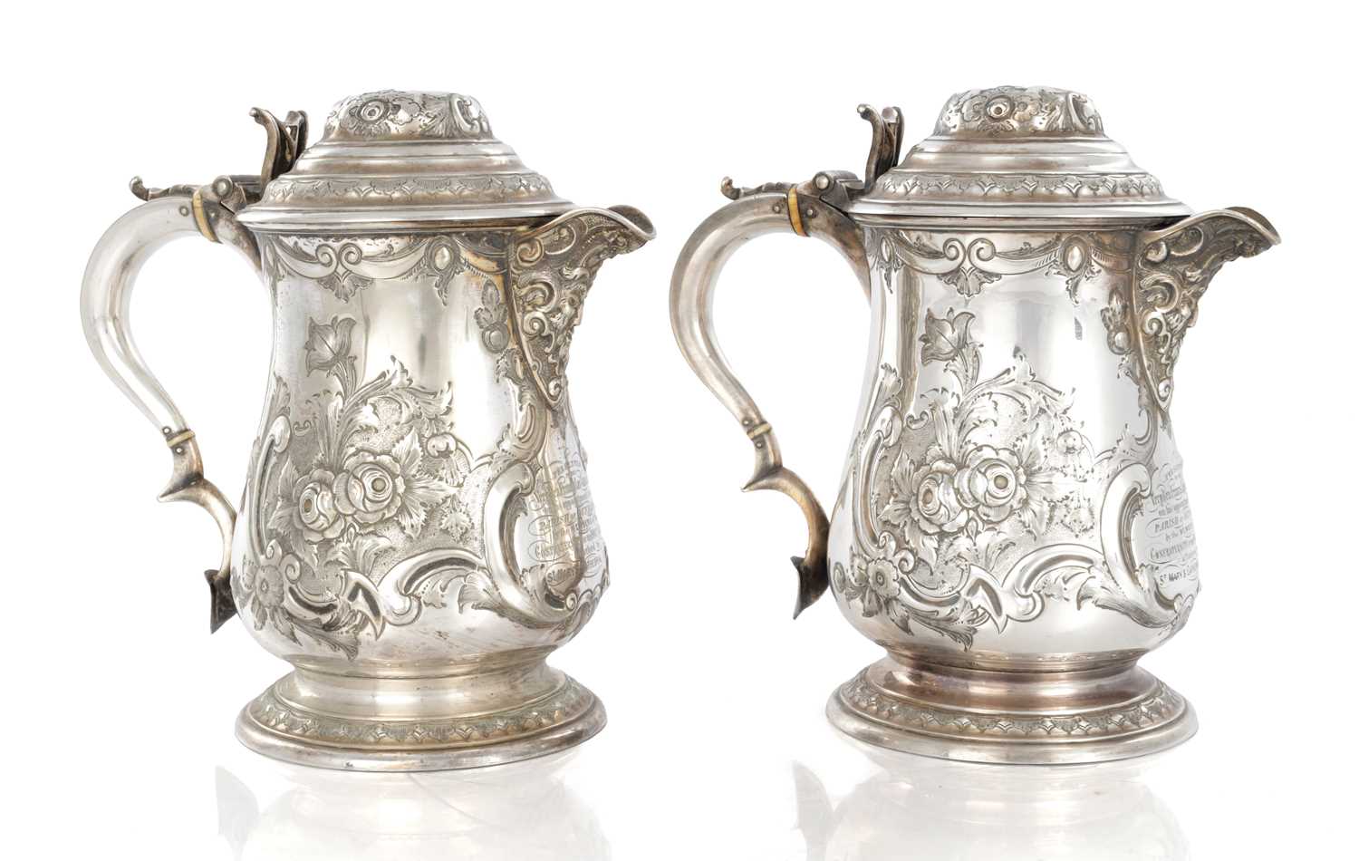 Lot 173 - A PAIR OF LARGE 19TH CENTURY MARTIN HALL & CO SILVER PLATED TANKARD JUGS