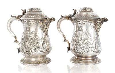 Lot 173 - A PAIR OF LARGE 19TH CENTURY MARTIN HALL & CO SILVER PLATED TANKARD JUGS