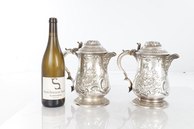 Lot 173 - A PAIR OF LARGE 19TH CENTURY MARTIN HALL & CO SILVER PLATED TANKARD JUGS