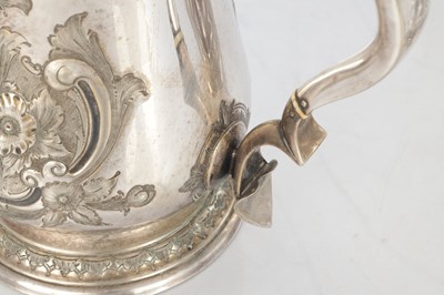 Lot 173 - A PAIR OF LARGE 19TH CENTURY MARTIN HALL & CO SILVER PLATED TANKARD JUGS