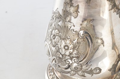 Lot 173 - A PAIR OF LARGE 19TH CENTURY MARTIN HALL & CO SILVER PLATED TANKARD JUGS