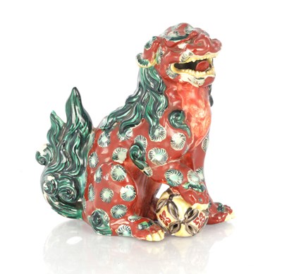 Lot 445 - A CHINESE CERAMIC FOO DOG SCULPTURE
