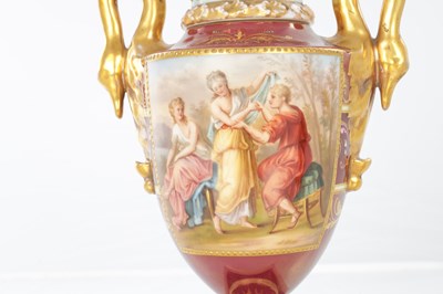 Lot 78 - A 19TH CENTURY VIENNA PORCELAIN TWO HANDLED LIDDED URN SHAPED VASE ON PEDESTAL