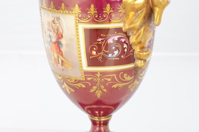Lot 78 - A 19TH CENTURY VIENNA PORCELAIN TWO HANDLED LIDDED URN SHAPED VASE ON PEDESTAL