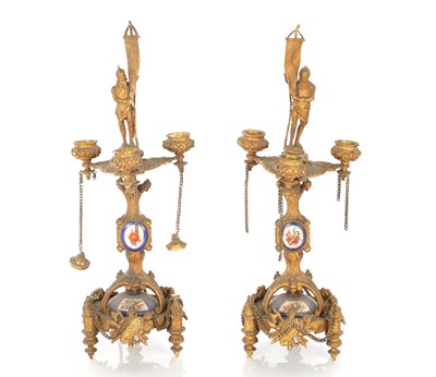 Lot 918 - A PAIR OF 19TH CENTURY ORMOLU AND SEVRES STYLE PANELLED FIGURAL CANDLESTICKS