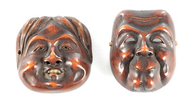 Lot 614 - TWO JAPANESE MEIJI PERIOD CARVED BOXWOOD MINIATURE MASKS