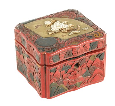 Lot 522 - A JAPANESE MEIJI PERIOD CARVED CINNABAR HINGED BOX