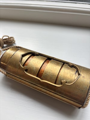 Lot 76 - AN UNUSUAL JAPANESE MEIJI PERIOD SIX CASE GOLD LACQUER INRO WITH OUTER SLEEVE