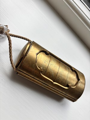 Lot 76 - AN UNUSUAL JAPANESE MEIJI PERIOD SIX CASE GOLD LACQUER INRO WITH OUTER SLEEVE