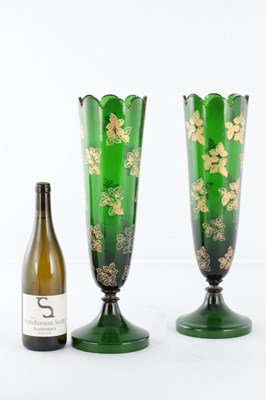 Lot 3 - A PAIR OF LATE 19TH CENTURY BOHEMIAN GREEN GLASS VASES WITH GOLD LEAF WORK DECORATION