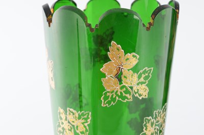 Lot 3 - A PAIR OF LATE 19TH CENTURY BOHEMIAN GREEN GLASS VASES WITH GOLD LEAF WORK DECORATION