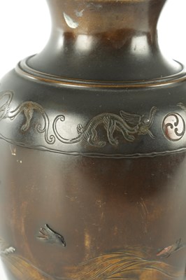 Lot 489 - A PAIR OF JAPANESE MEIJI PERIOD BRONZE AND MIXED METAL VASES