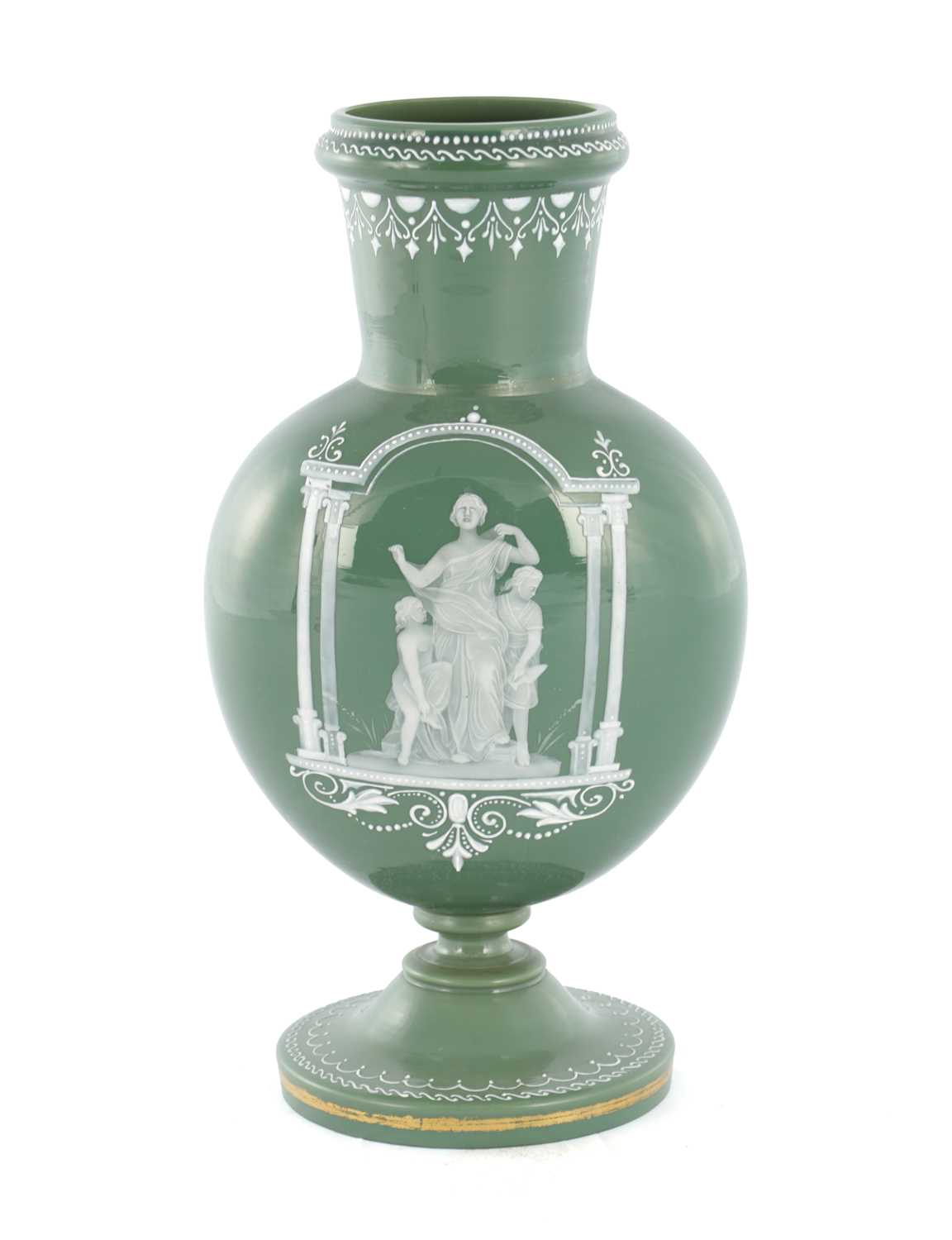 Lot 11 - AN UNUSUAL LATE 19TH CENTURY GREEN GLASS AND OPAQUE ENAMEL DECORATED VASE