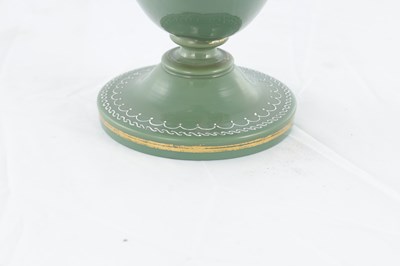 Lot 11 - AN UNUSUAL LATE 19TH CENTURY GREEN GLASS AND OPAQUE ENAMEL DECORATED VASE