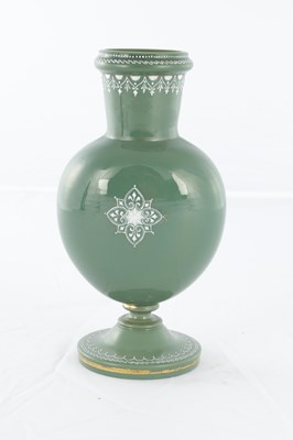 Lot 11 - AN UNUSUAL LATE 19TH CENTURY GREEN GLASS AND OPAQUE ENAMEL DECORATED VASE