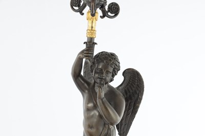 Lot 575 - A PAIR OF 19TH CENTURY FRENCH BRONZE AND GILT BRONZE FOUR BRANCH FIGURAL CANDELABRA