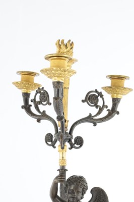 Lot 575 - A PAIR OF 19TH CENTURY FRENCH BRONZE AND GILT BRONZE FOUR BRANCH FIGURAL CANDELABRA