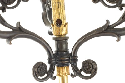Lot 575 - A PAIR OF 19TH CENTURY FRENCH BRONZE AND GILT BRONZE FOUR BRANCH FIGURAL CANDELABRA
