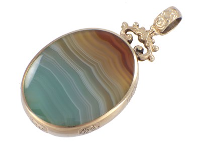 Lot 155 - A 9CT GOLD MOUNTED OVAL AGATE STONE PENDANT