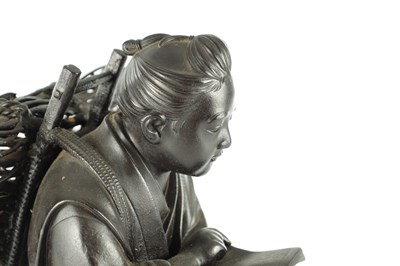 Lot 57 - A JAPANESE MEIJI PERIOD BRONZE FIGURE OF A WOOD CUTTER