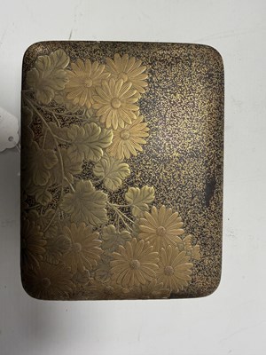 Lot 570 - A JAPANESE MEIJI PERIOD GILT LACQUERED RECTANGULAR BOX AND COVER