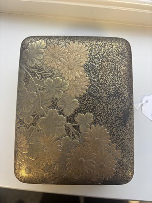Lot 570 - A JAPANESE MEIJI PERIOD GILT LACQUERED RECTANGULAR BOX AND COVER