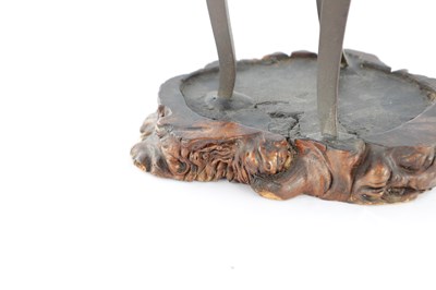 Lot 470 - AN EARLY CHINESE ARCHAISTIC BRONZE TRIPOD VESSEL