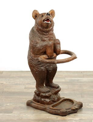 Lot 951 - A LATE 19TH CENTURY CARVED BLACK FOREST BEAR STICK STAND