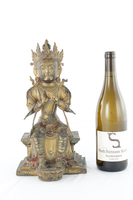 Lot 436 - A CHINESE GILT BRONZE SEATED BUDDHA