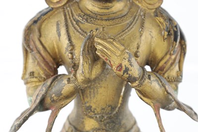 Lot 436 - A CHINESE GILT BRONZE SEATED BUDDHA