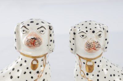 Lot 28 - TWO PAIRS OF 19TH CENTURY STAFFORDSHIRE DOGS