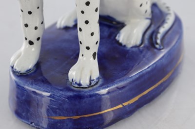 Lot 28 - TWO PAIRS OF 19TH CENTURY STAFFORDSHIRE DOGS