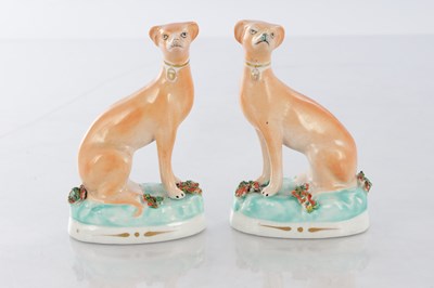 Lot 28 - TWO PAIRS OF 19TH CENTURY STAFFORDSHIRE DOGS