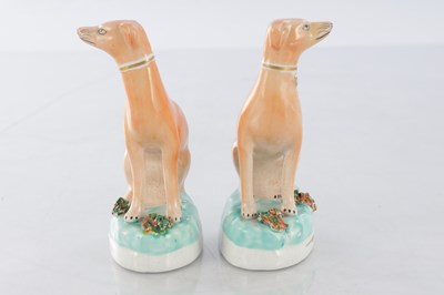 Lot 28 - TWO PAIRS OF 19TH CENTURY STAFFORDSHIRE DOGS