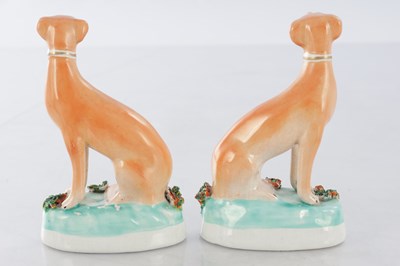 Lot 28 - TWO PAIRS OF 19TH CENTURY STAFFORDSHIRE DOGS