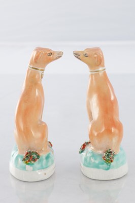 Lot 28 - TWO PAIRS OF 19TH CENTURY STAFFORDSHIRE DOGS