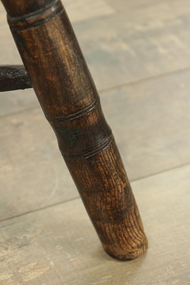 Lot 1726 - AN EARLY 19TH CENTURY ASH AND ELM STICK BACK PRIMITIVE WELSH WINDSOR CHAIR