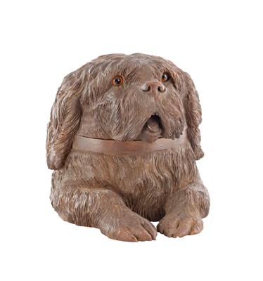 Lot 945 - A 19TH CENTURY BLACK FOREST CARVED LINDEN WOOD MUSICAL DOGS HEAD TABACCO BOX