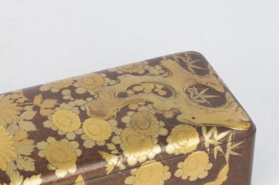Lot 590 - A JAPANESE MEIJI PERIOD LIDDED RAISED LACQUERWORK BOX