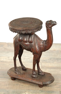 Lot 422 - A 19TH CENTURY CARVED HARDWOOD ANGLO-INDIAN CAMEL TABLE