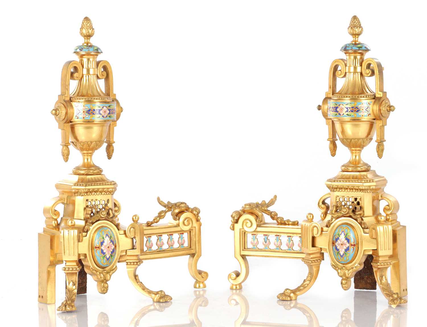 Lot 681 - A PAIR OF LATE 19TH CENTURY FRENCH ORMOLU AND CHAMPLEVE ENAMELLED FIRE DOGS