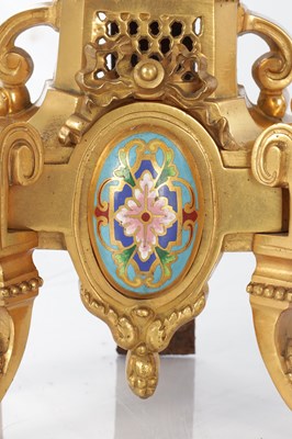 Lot 681 - A PAIR OF LATE 19TH CENTURY FRENCH ORMOLU AND CHAMPLEVE ENAMELLED FIRE DOGS